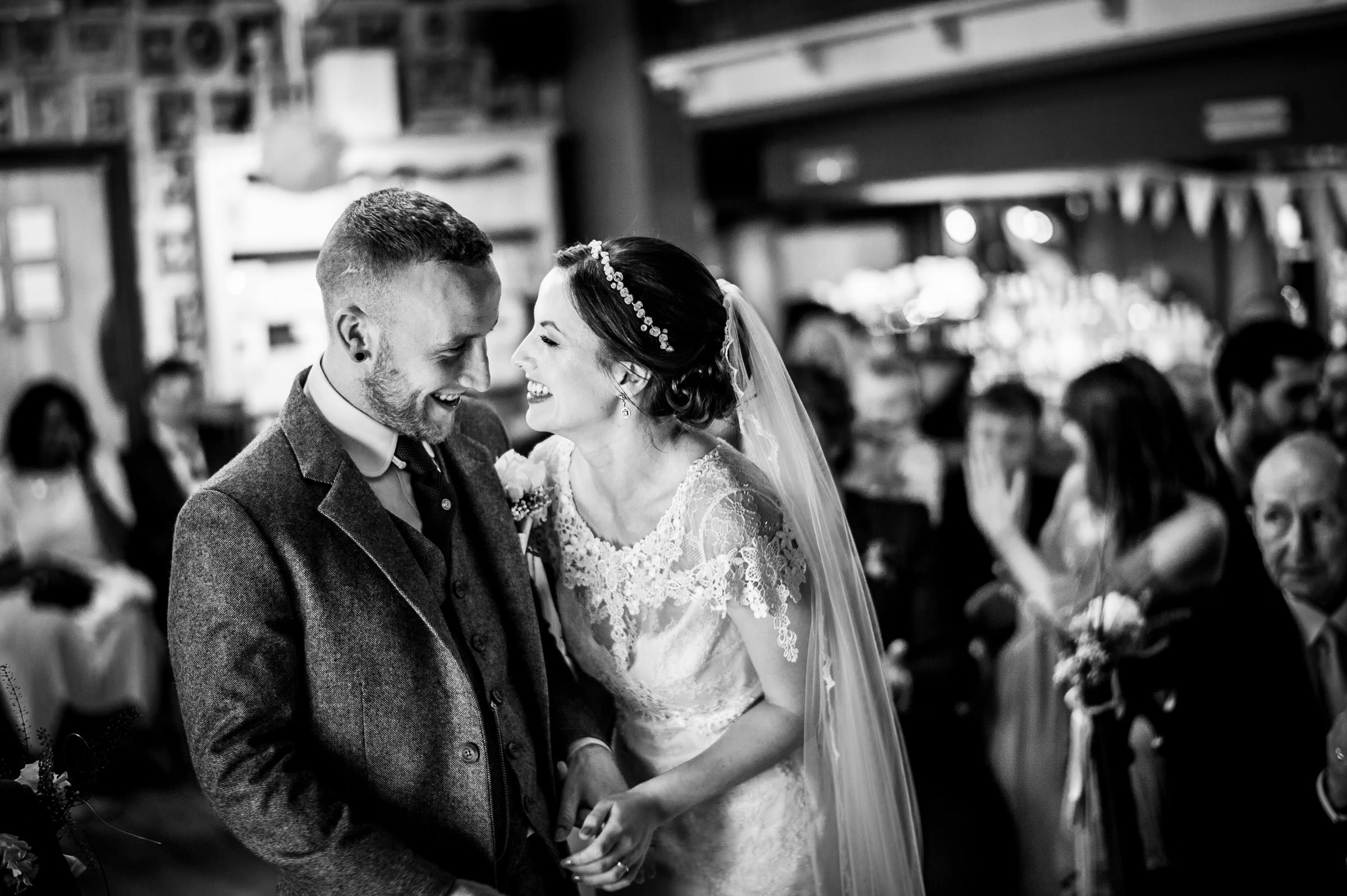 black and white wedding photo of bride and groom.jpg