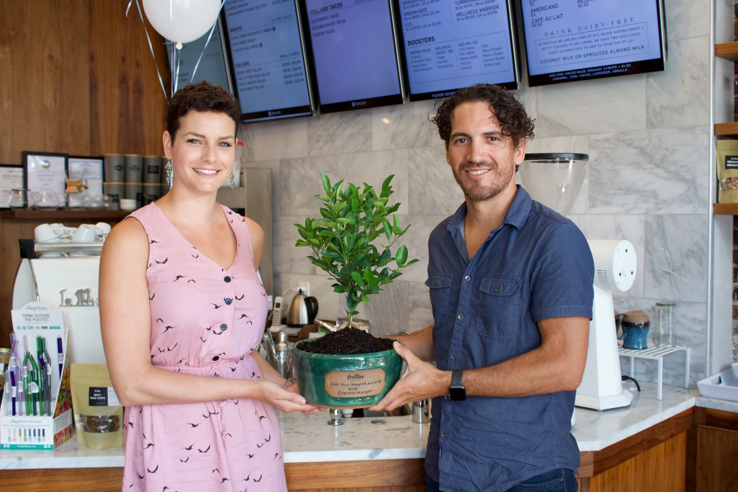Gregg Rozeboom presenting Crystal Harper with award