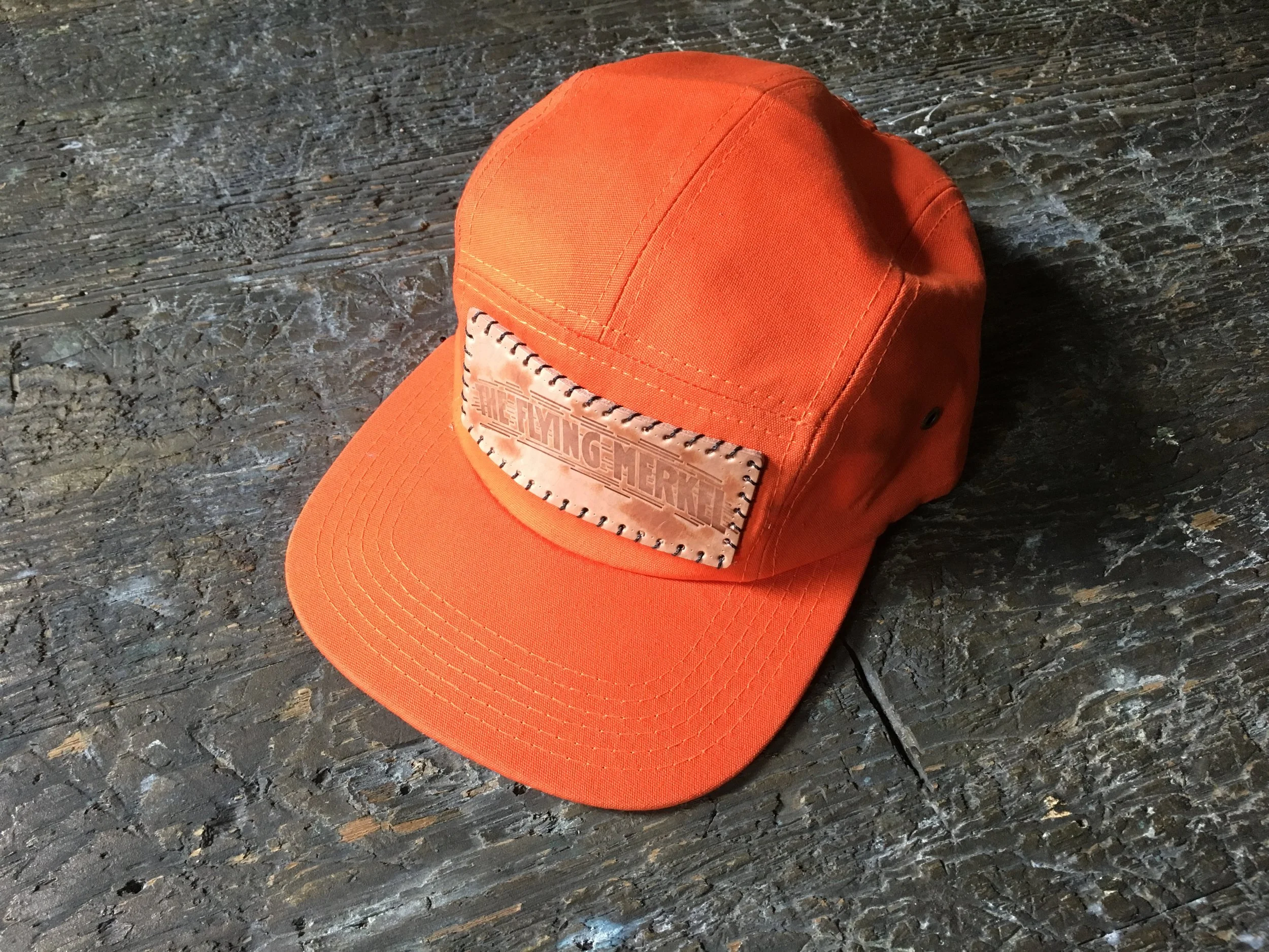 Orange 5 Panel hat w/ handmade & handsewn Flying Merkel patch