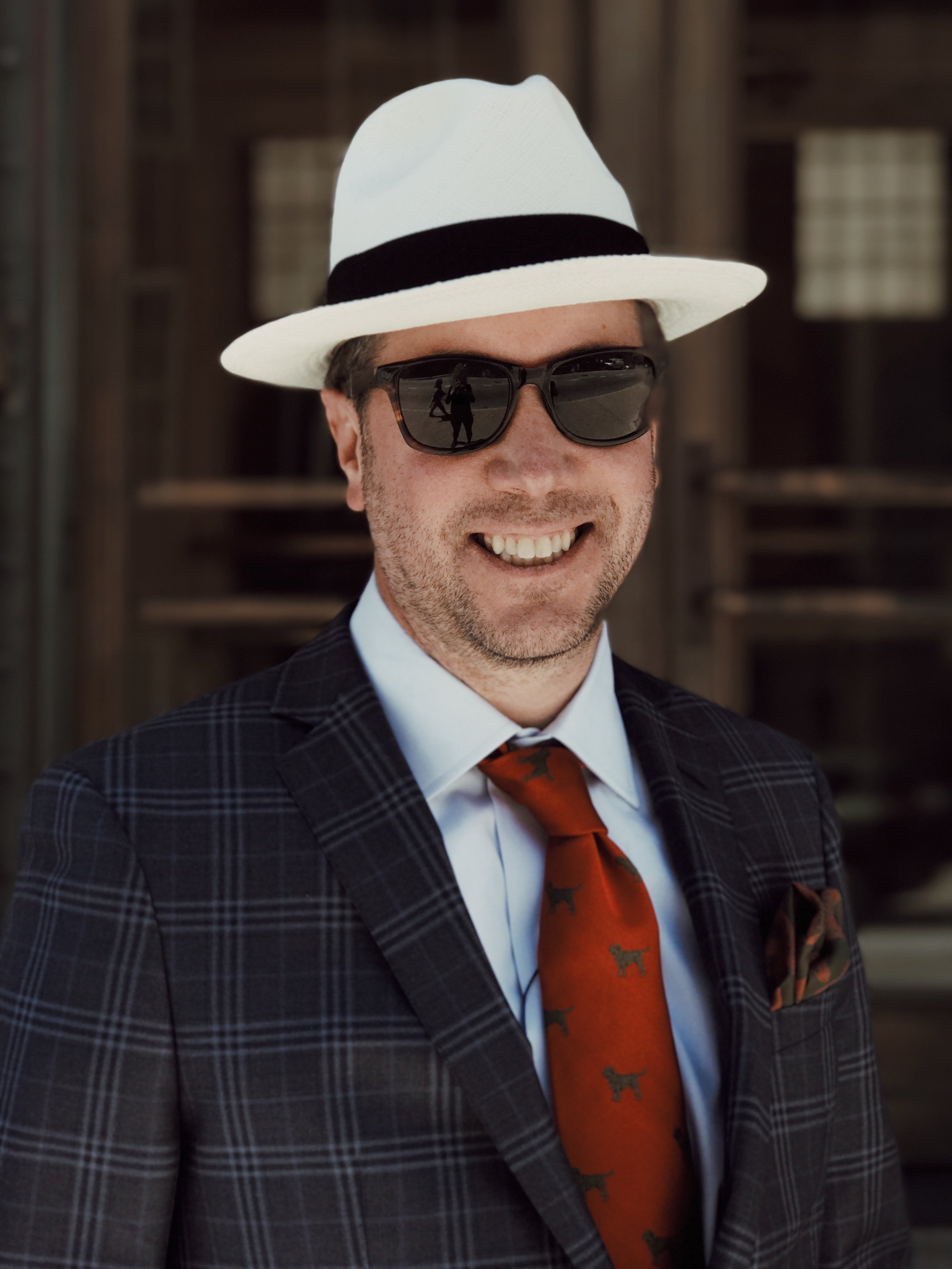 On Craig: Hat: Scala, Sunglasses: Shwood, Shirt: Ledbury, Sportcoat: BluJacket, Necktie & Pocket Square: Seaward & Stern