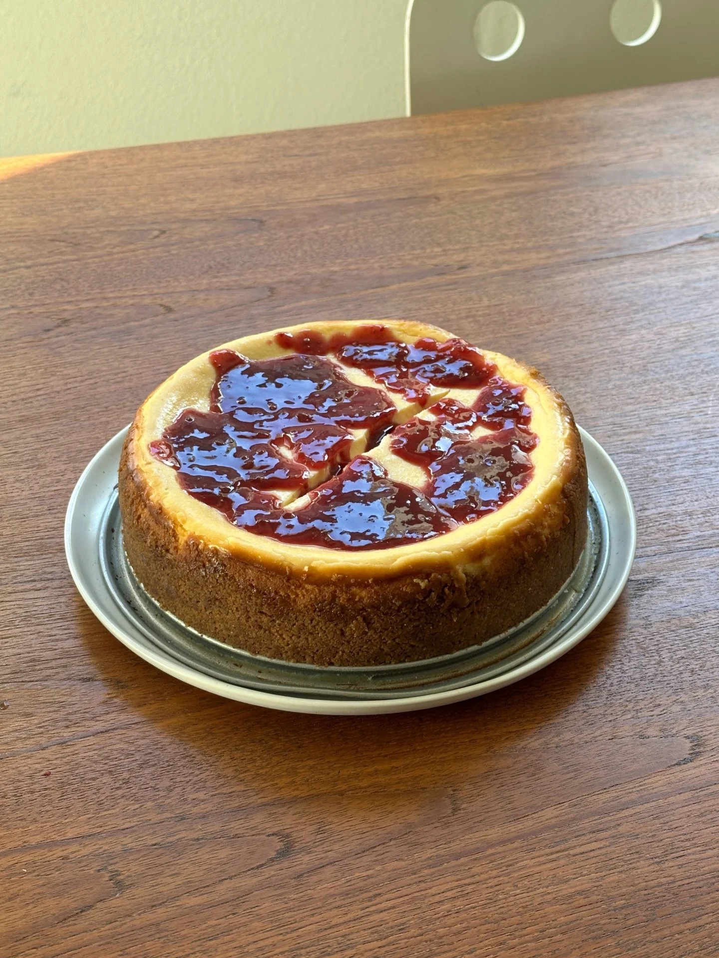 ny cheesecake with raspberry sauce (honestly looks a bit gory) &mdash; yes it cracked. yes it&rsquo;s because i didn&rsquo;t let it cool in the oven &amp; i didn&rsquo;t use a water bath bc lazy. yes it was still delicious.