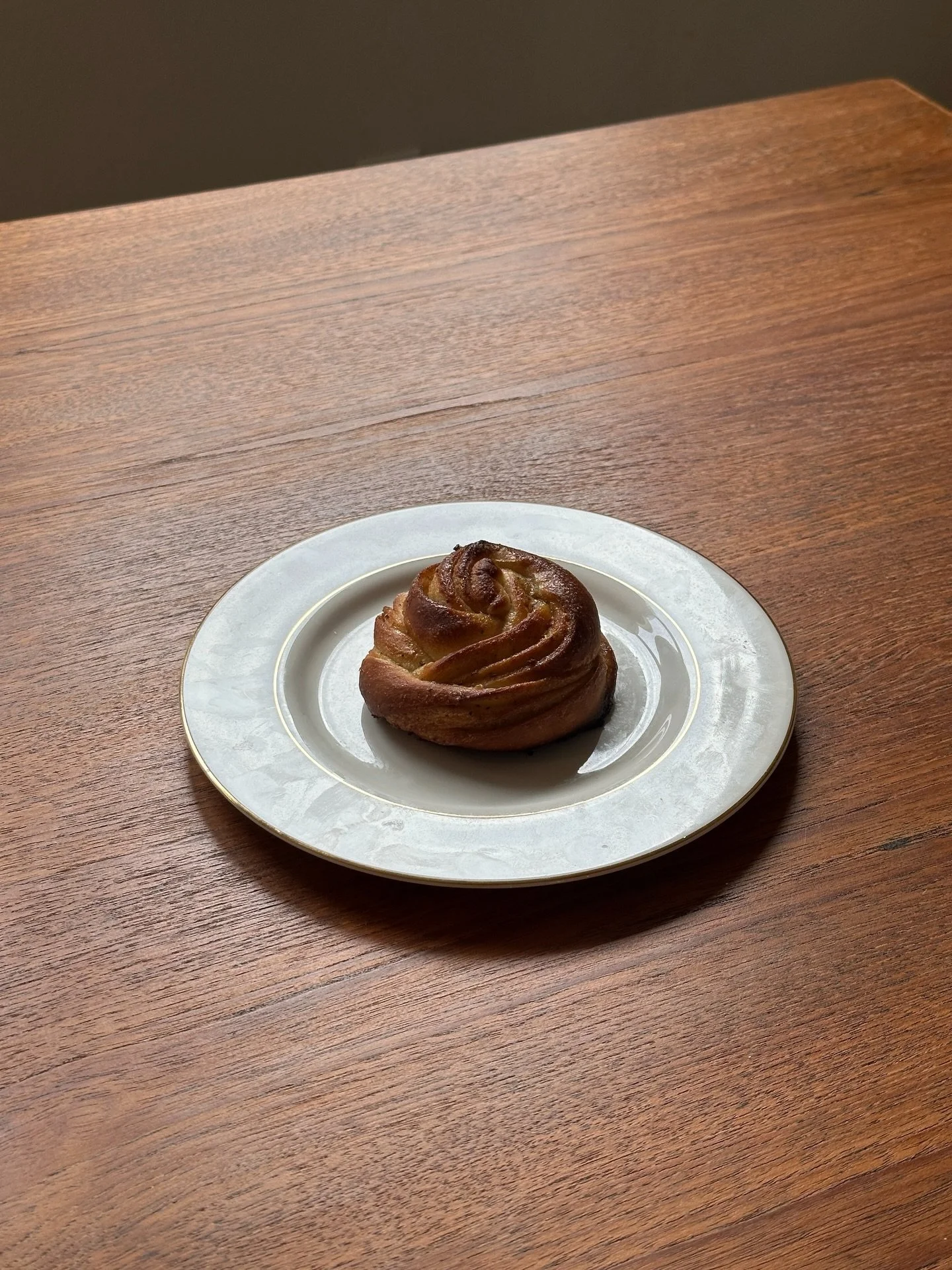not now sweetie i&rsquo;m busy thinking about copenhagen again &hellip;. 
cardamom buns w fresh ground cardamom for coffee house inspired by the buns we had at @juno_the_bakery and @riviera_cph 🌀 thank u @koobiegram for helping picking the seeds out