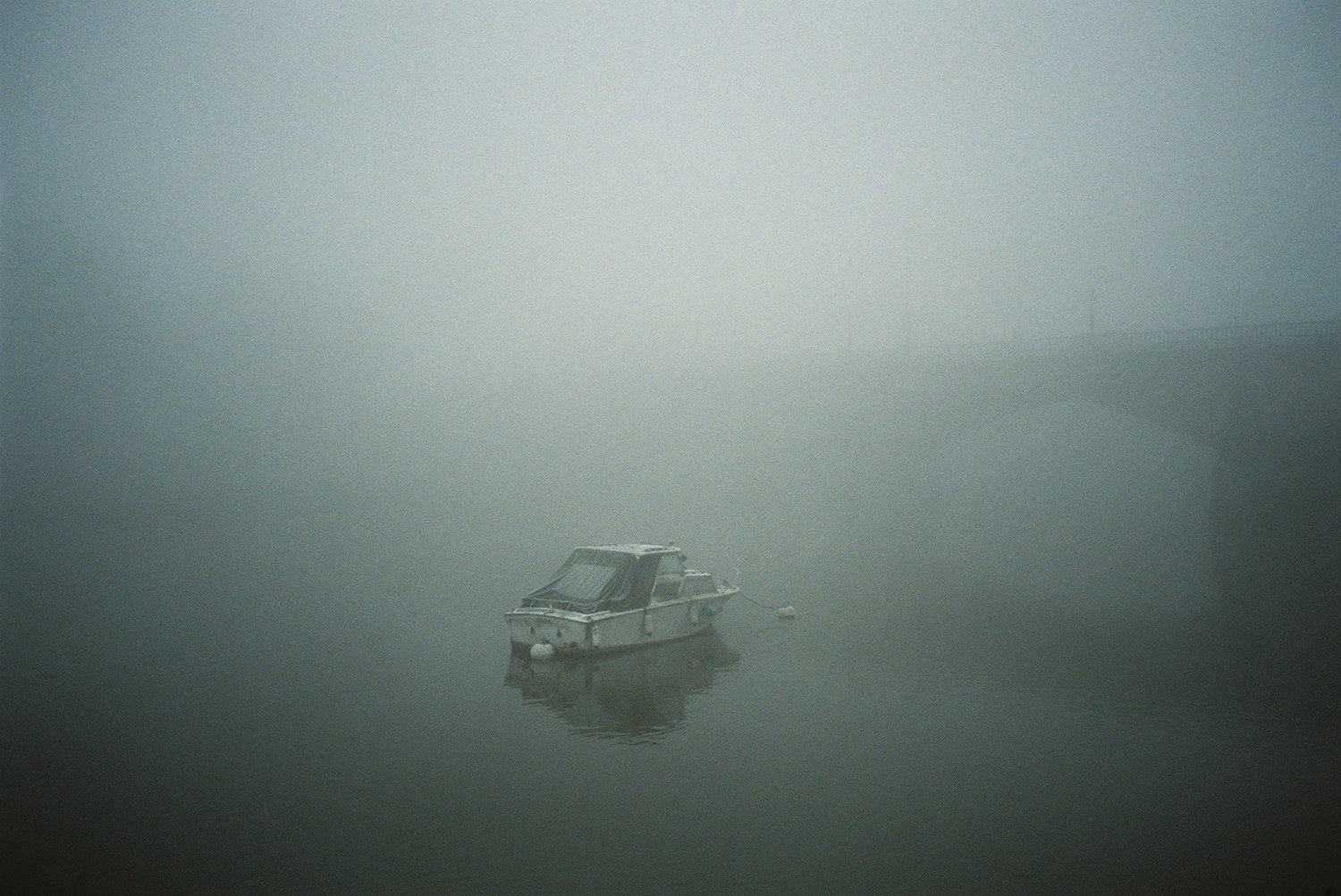 London's Richmond photographed on foggy morning. Taken with a Olympus MjuII camera and Fuji 400H film. By Dmitry Serostanov.