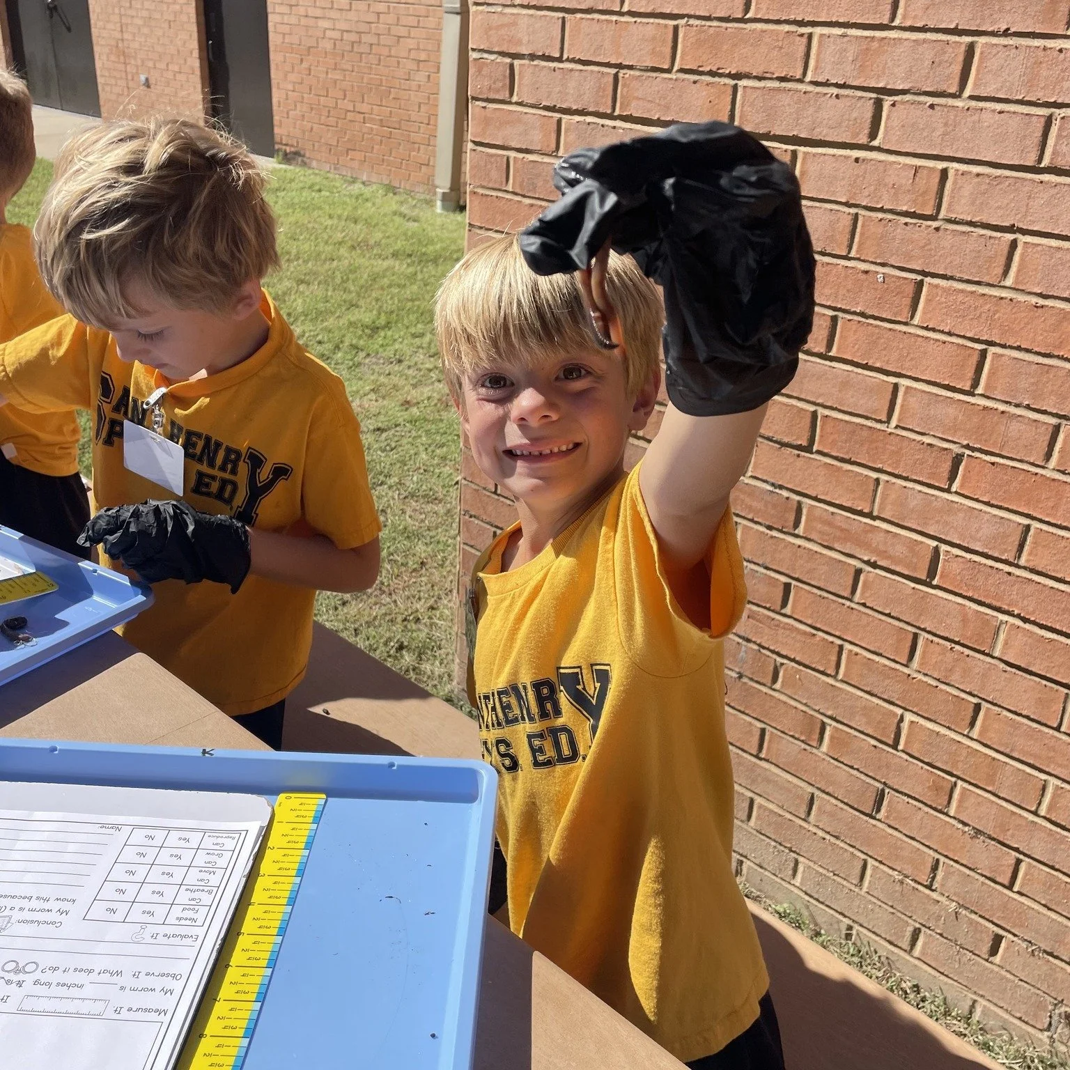 1st graders explored the characteristics of living things by observing earthworms! They measured the length, counted the segments, and recorded their observations. Through this activity, students learned how to identify traits of living things&mdash;