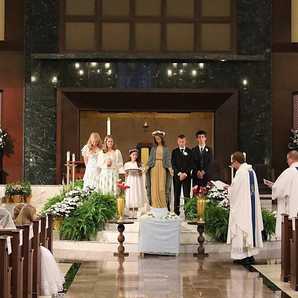 O Mary! we crown thee with blossoms today, Queen of the Angels, Queen of the May. This week's all-school mass was extra special as it included the 8th graders beautiful May Crowning and a special procession of our First Communicants (2nd graders).