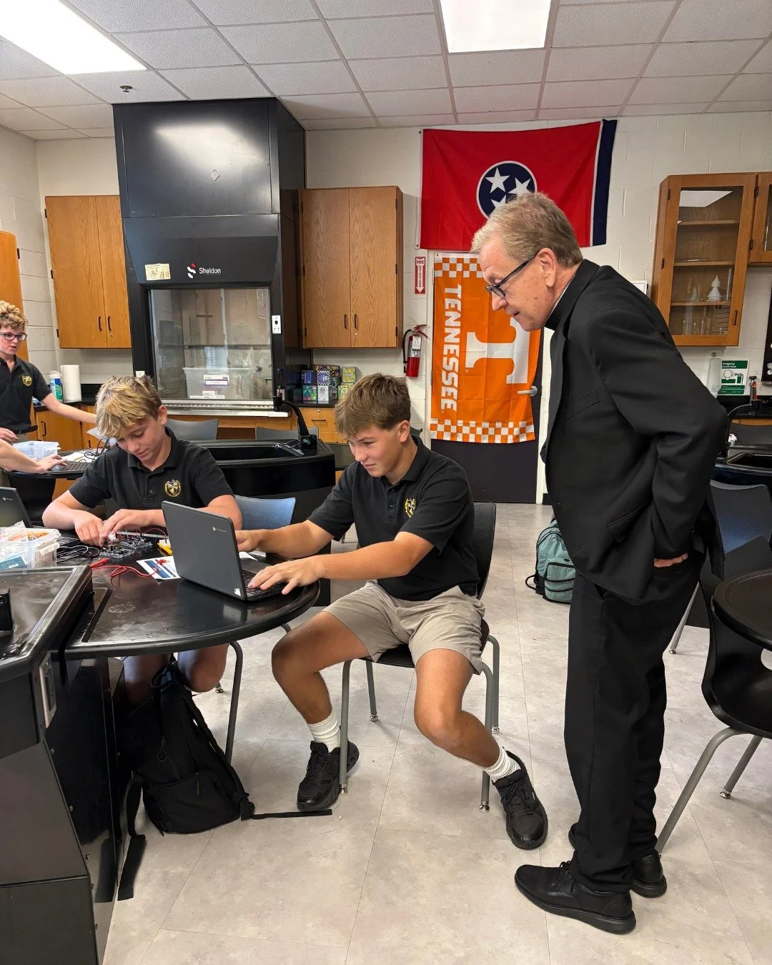Did you know?

Each week, our Pastor, Fr. Eric Fowlkes, takes time to visit our classrooms throughout Saint Henry School! This week, Sister John Mary joined Father for a visit to Mrs. Penne&rsquo;s Robotics class, where students had the opportunity t