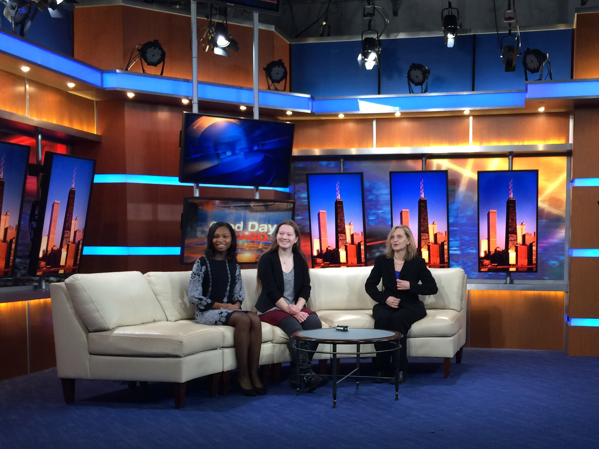  Julia Bachrach with high school students Aela Morris and Chloe Grace in preparation for interview on Fox News, 2016. 