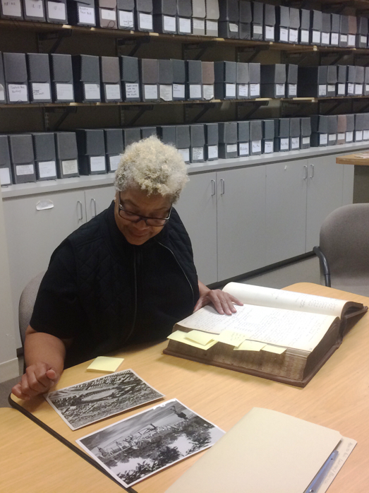 Researcher working in Chicago Park District Archives Room, 2016.