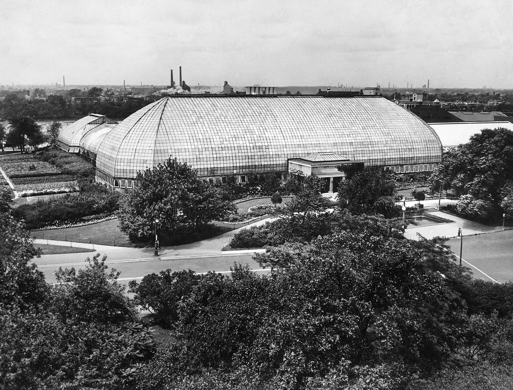 View towards the front of the conservatory complex—the large “haystack-shaped” Palm House made the facility look entirely different than other public greenhouses in Chicago and elsewhere, ca. 1930. Chicago Public Library Special Collections, Chicago Park District Archives, Photos.