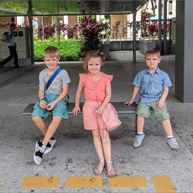 Kids waiting for public transit