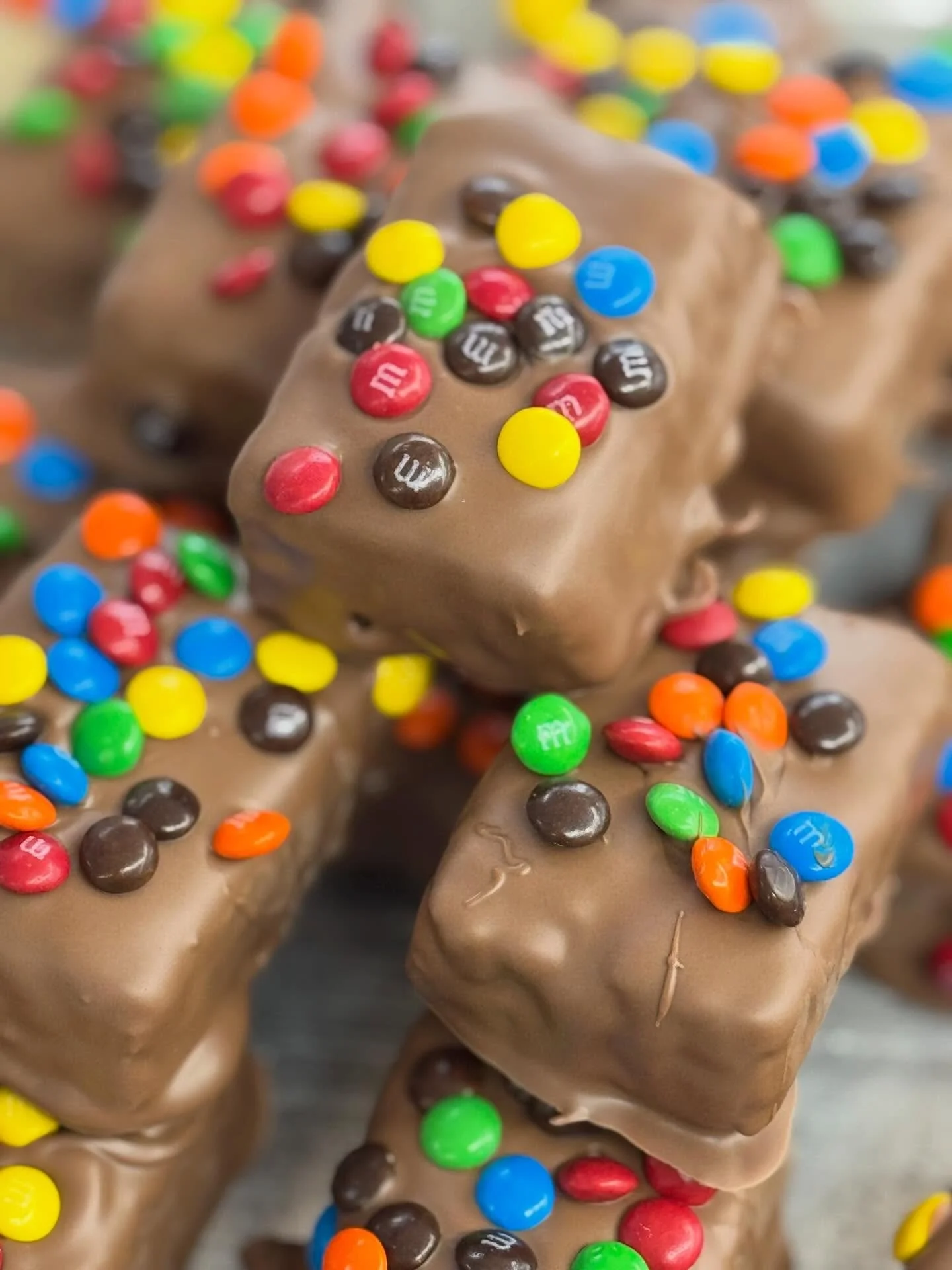 M&amp;M Chocolate Covered Rice Krispie Treats?
I mean I guess that sounds utterly mouthwateringly delicious, but that&rsquo;s just us 🤷🏼&zwj;♀️🤤 
#ptown #capecod #familybuisness #candystore #summer2026