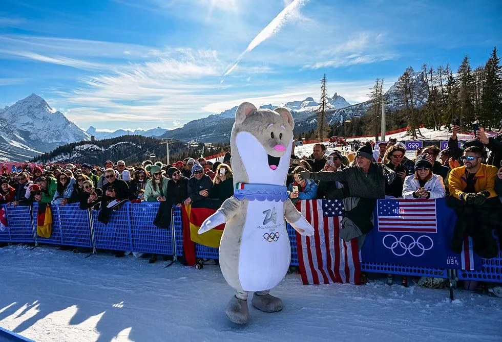 Olympic Mascot in front of large crowd