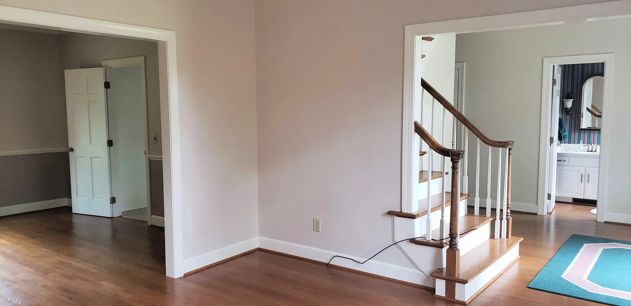 The door to the left in this photo would be removed, and the opening into the kitchen would be widened to 6 feet.