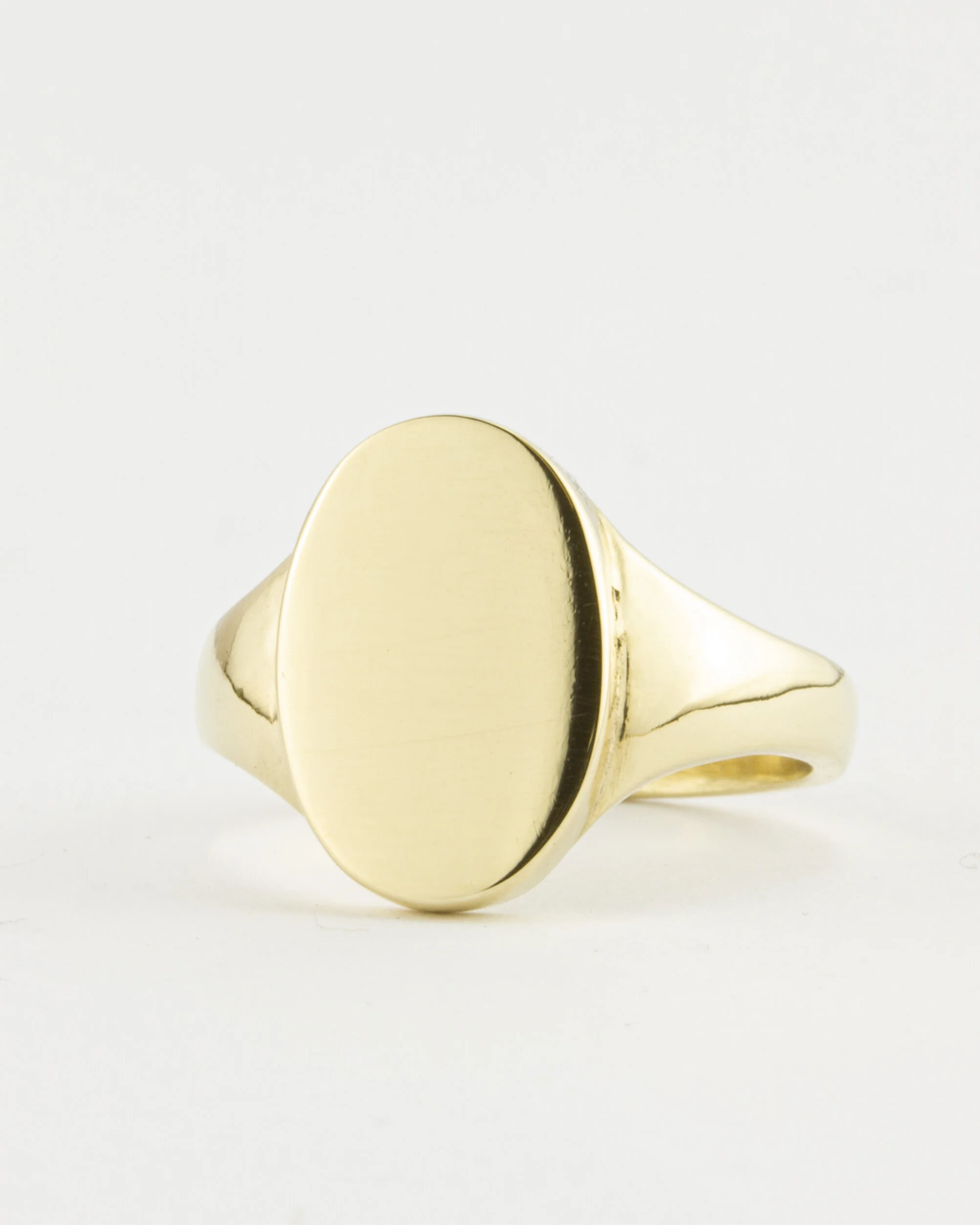 Henson and Gold Plain Oval Signet Ring 1 .jpg