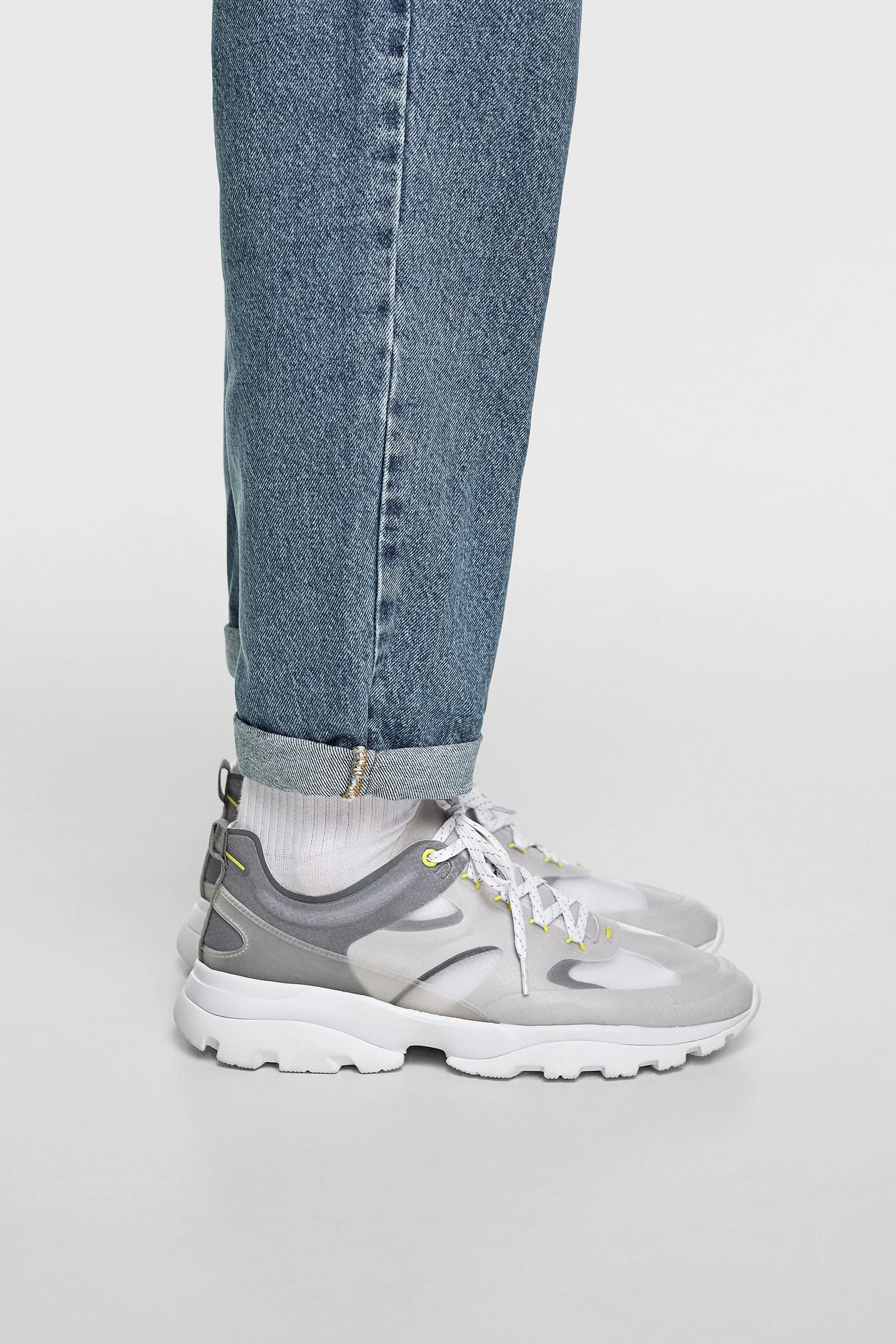 SNEAKERS WITH TRANSPARENTS PIECES DETAILS C$99.90
