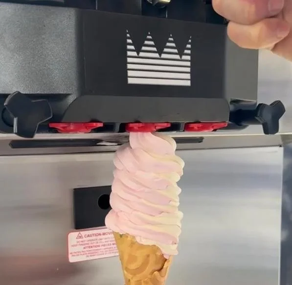 Making a soft serve ice cream cone