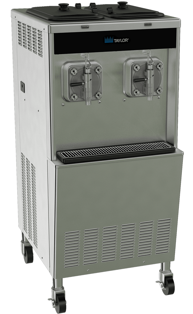 A Taylor commercial frozen beverage machine with two dispensing heads, stainless steel finish, drip tray, and rolling casters.