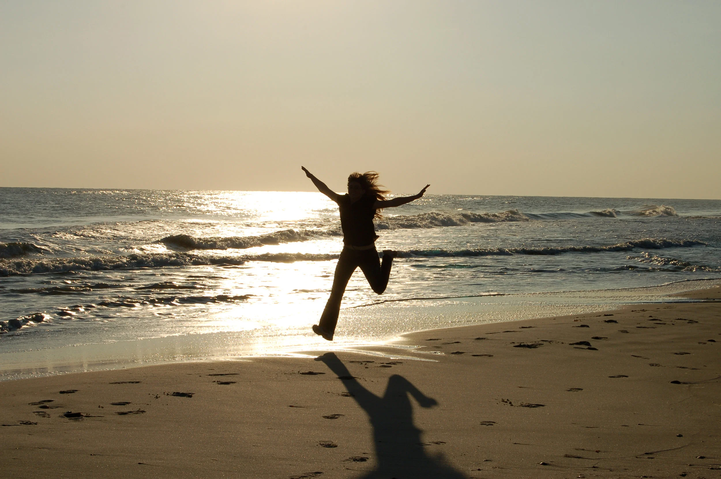 girl-running-on-beach.jpg