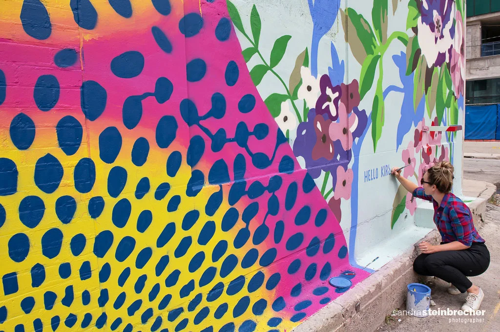 Signing the Listen to Learn Mural in Chicago