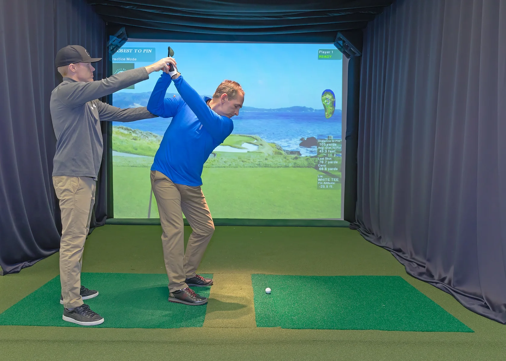 _E7Y9261 W Jon positioning Mike's backswing 1680.jpg
