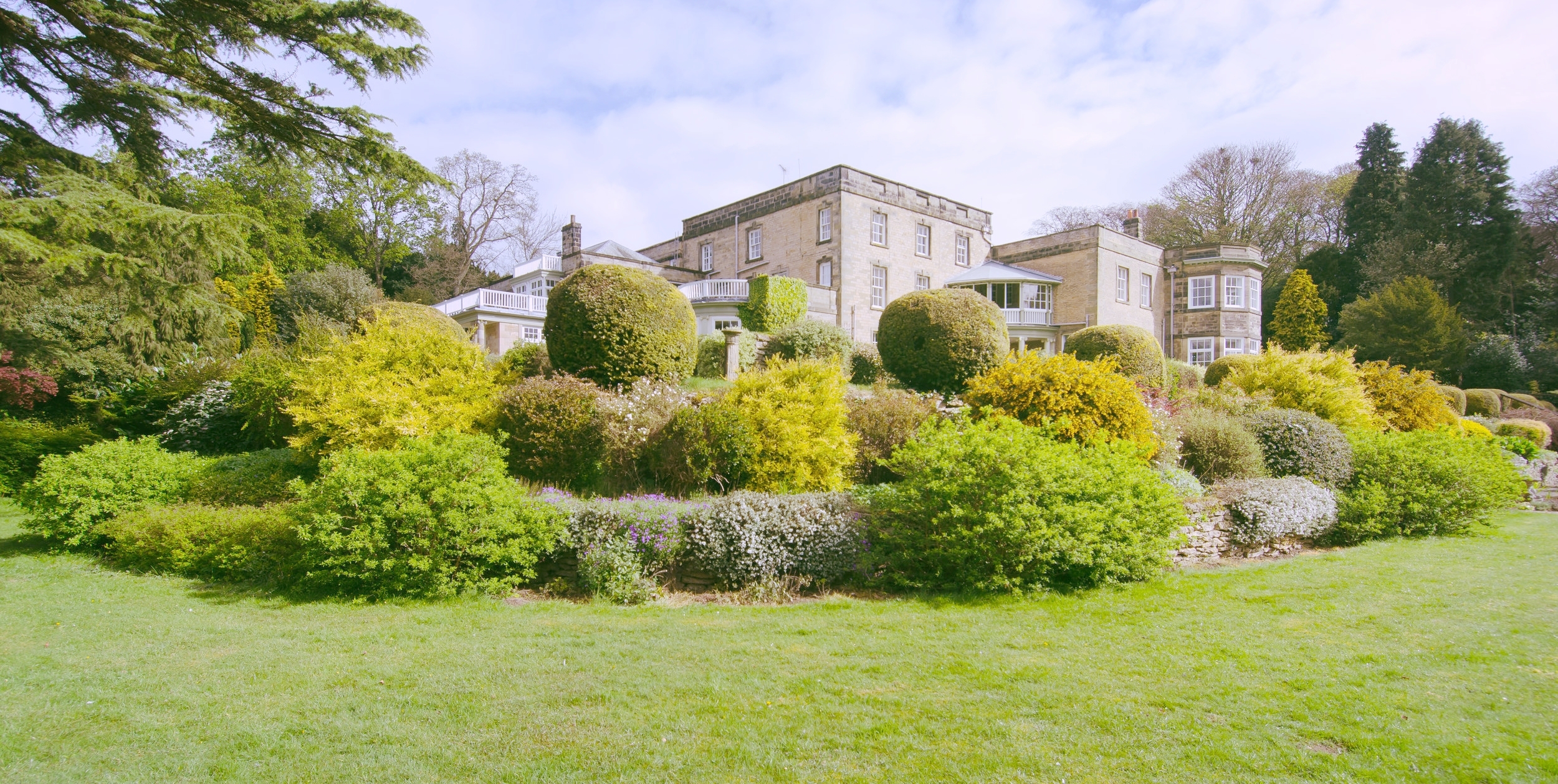 Wydale Hall retreat house surrounded by green gardens
