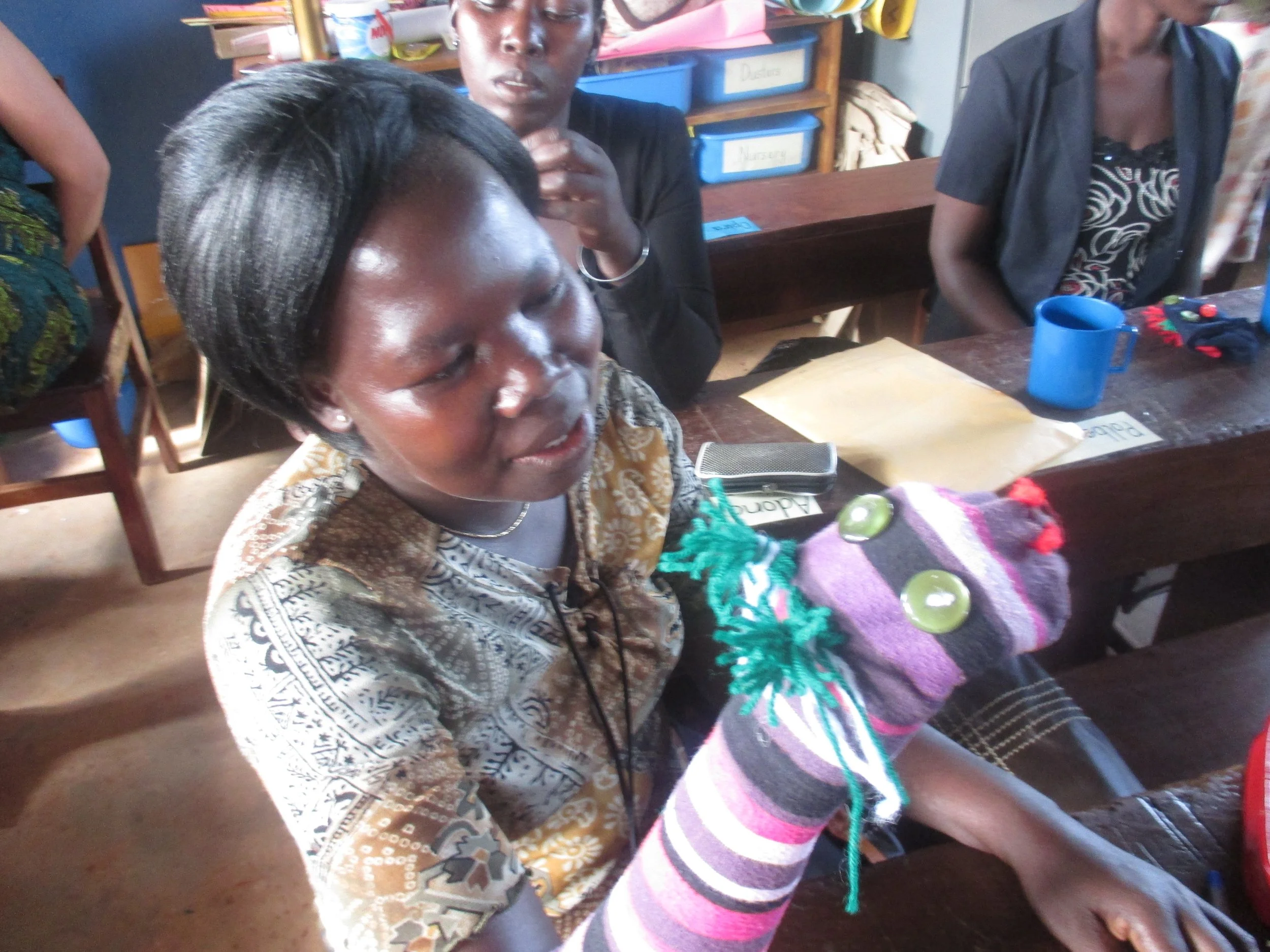 A teacher creating Phonemic Awareness with her new puppet.