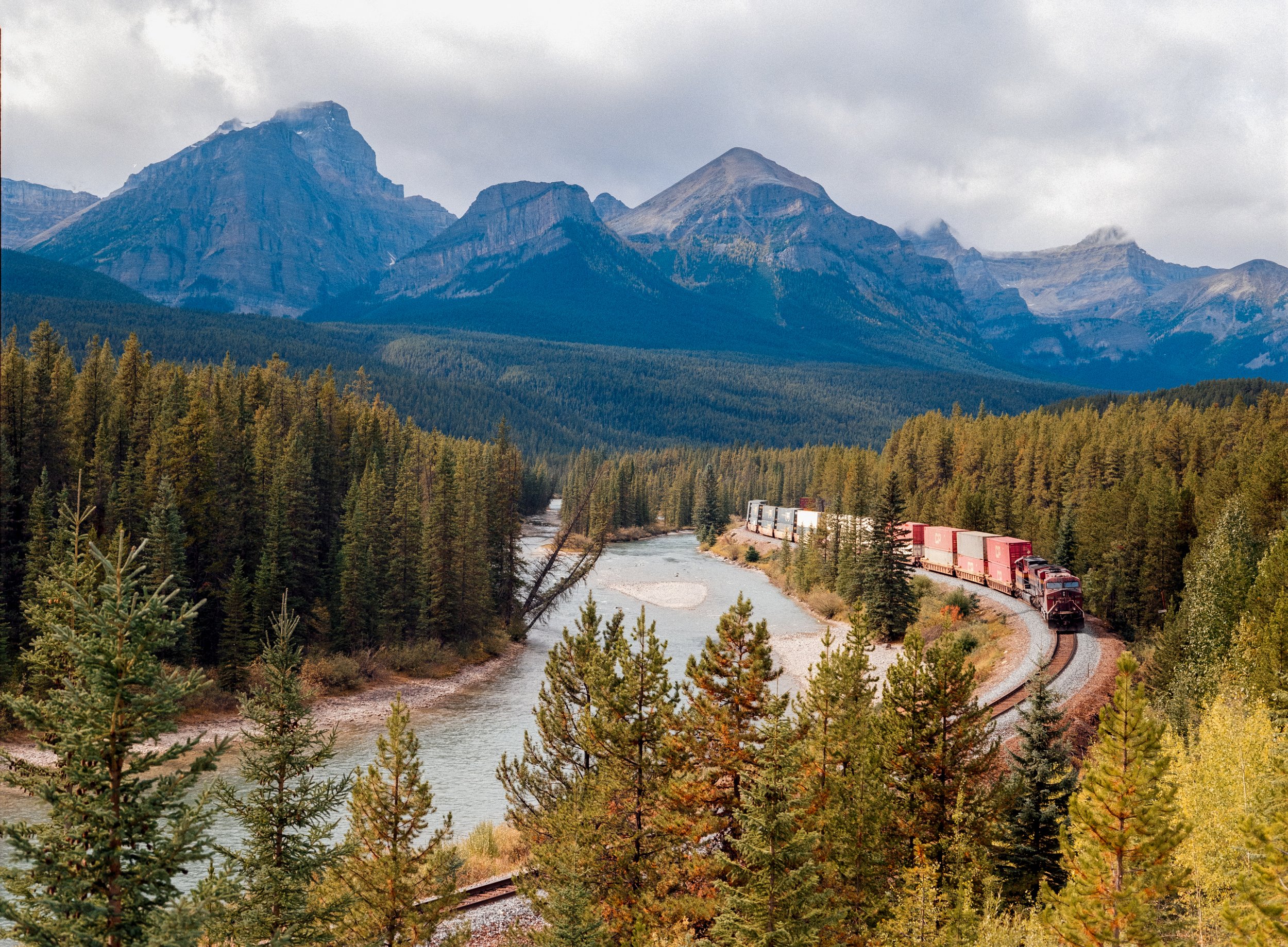 A Canadian Pacific Railway train traversing Morant’s Curve on an autumnal day.