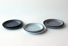 Linum saucer small Ø 8,5cm and medium Ø 10cm, 2000