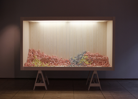 STOCK V , 2015 / Finnish Institute, Paris. LES MAINS DANS L´ARGILE Exhibition ( W380 D100 H300 cm) Stained porcelain, spruce, fabric, electric components for lighting