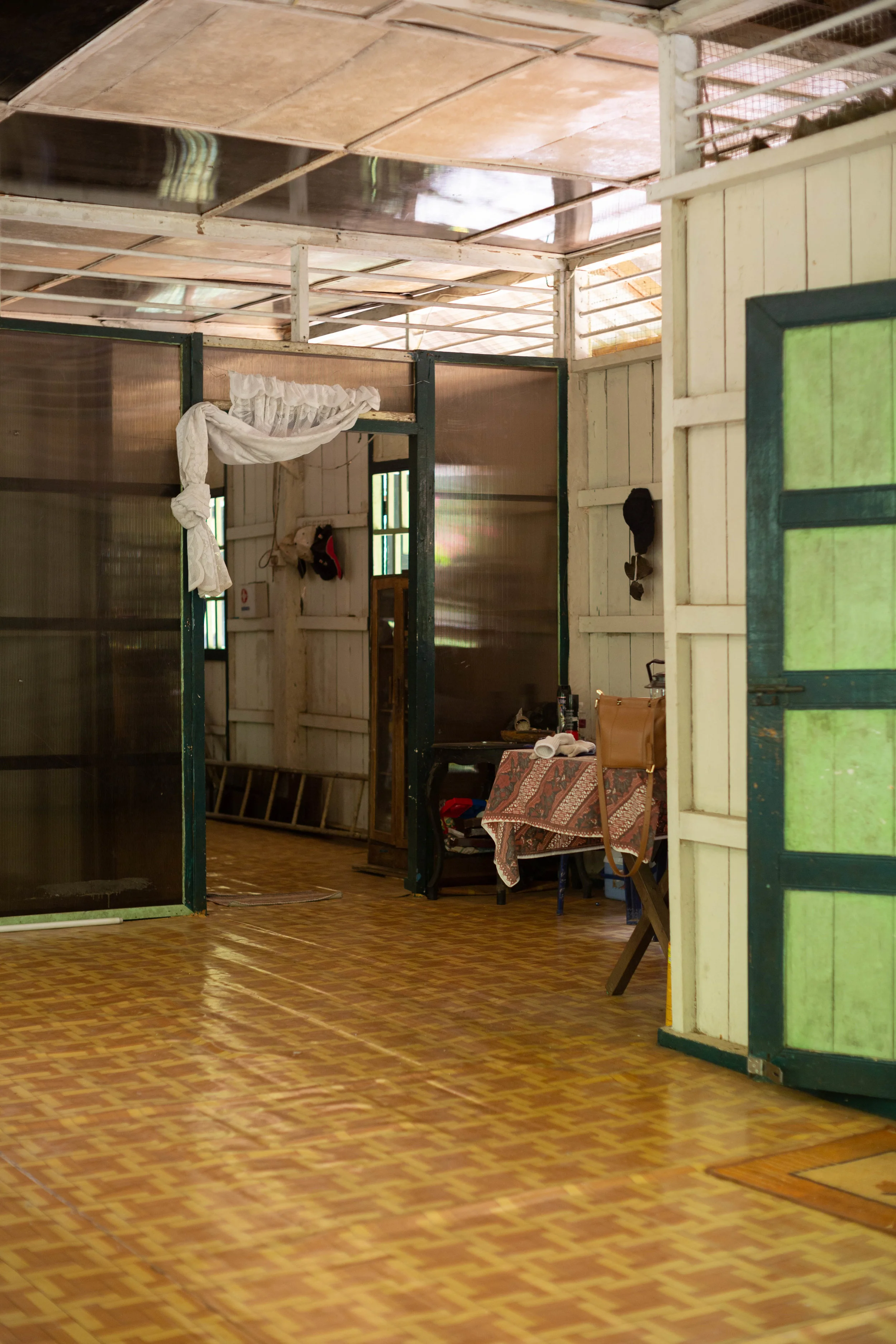 Interior of the Kampong house, showcasing the tradition air vents by the ceiling the allow airflow across the house, an adequate alternative to costly modern climate control technology
