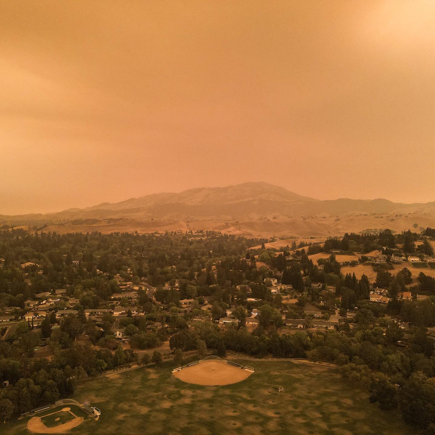 Before and after. I had to wipe the ash off my phone before sending this out. Woot @exxonmobil and @chevron knew this could happen.
.
.
#bayareafires #fire #drone #dronestagram #fire #smoke #orangesky #smokeysky #california #beforeandafter