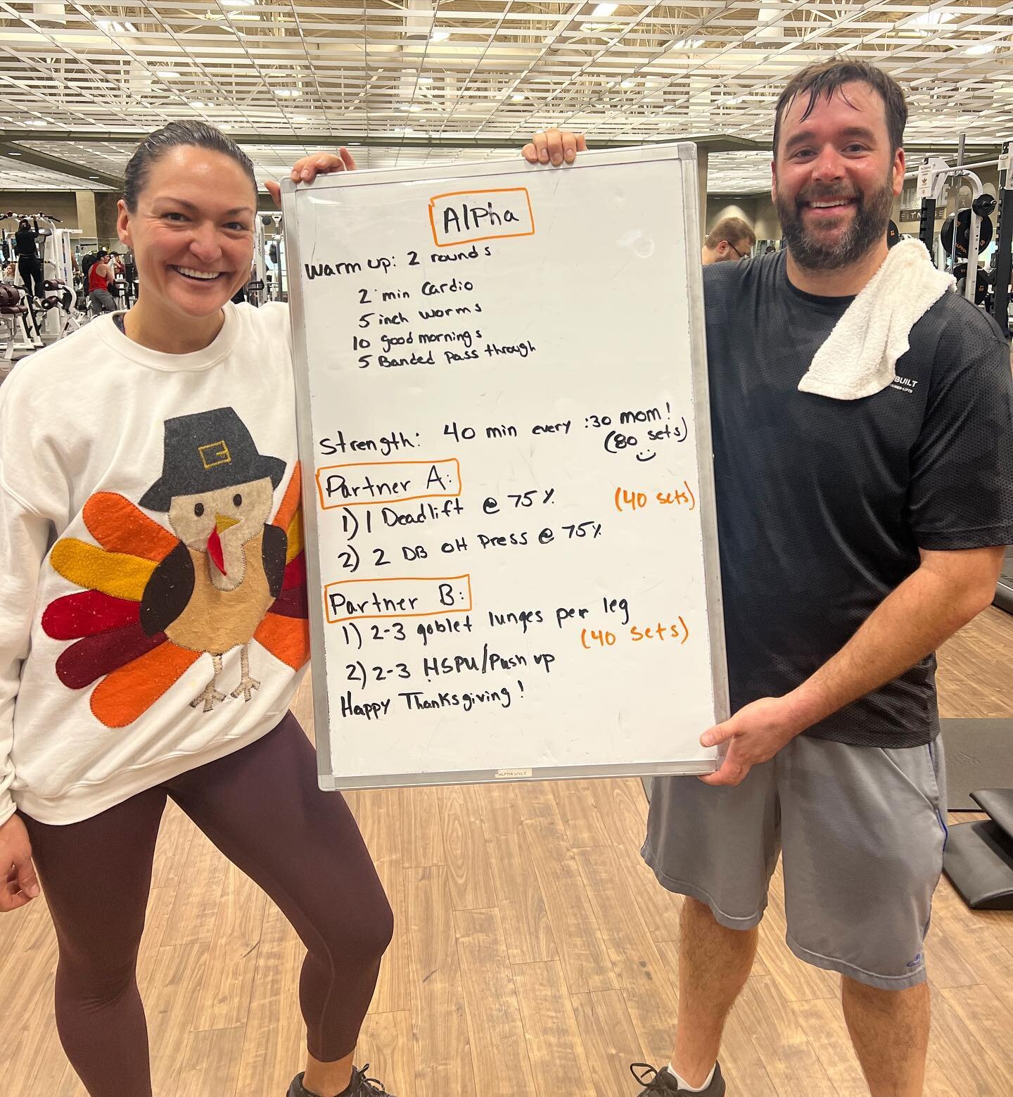I really wanted to get a cute holiday photo of us together with the dog and cat, a nice little family photo. 
This is what I have. 
A photo of us holding @hking62782&rsquo;s workout board at @lifetime.life on Thanksgiving morning. 
The couple that