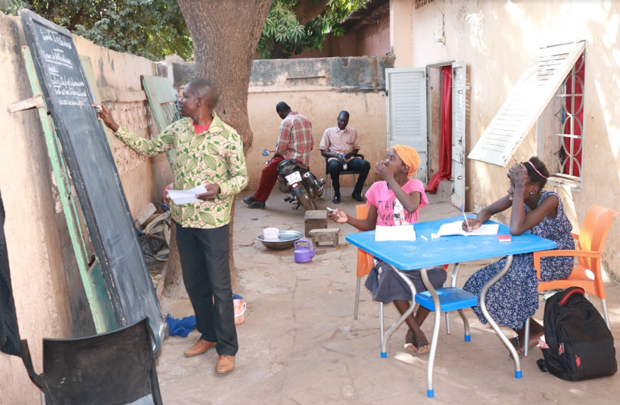 Diakassan & Kadiatou during their tutoring session. December, 2018