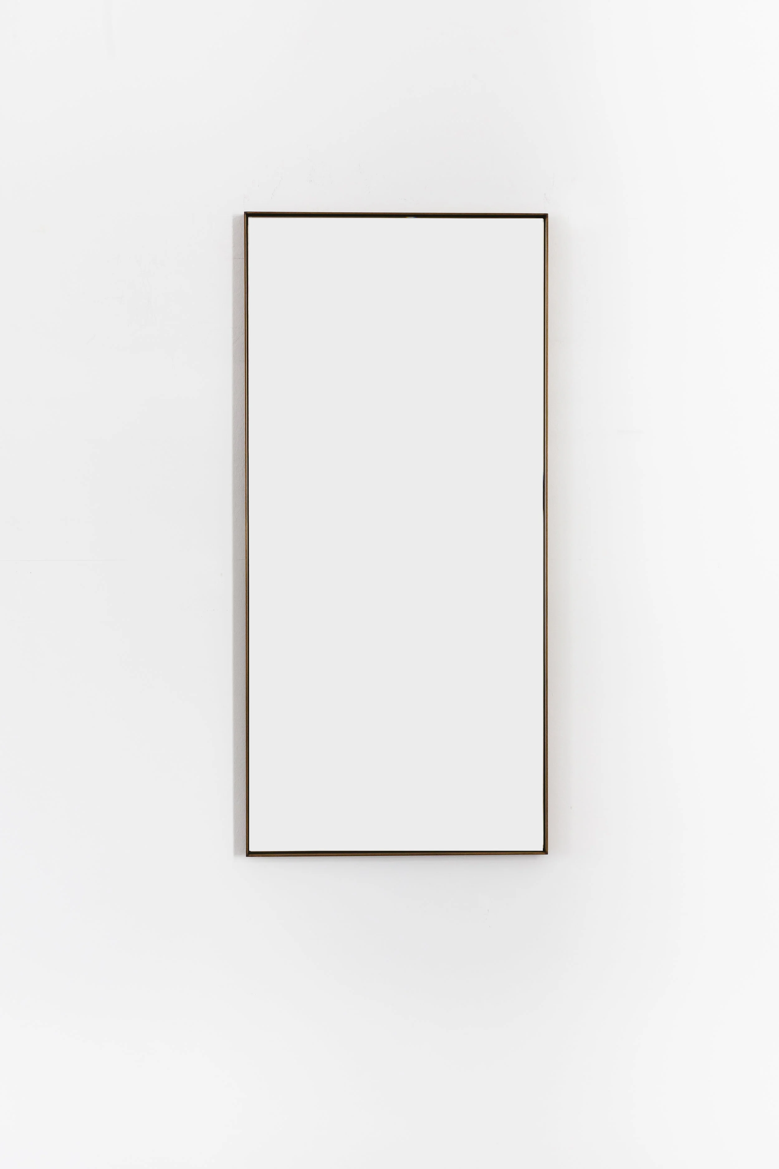 edie aged brass front.jpg