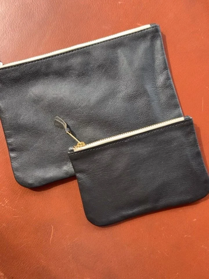 The Joseph pouch is a flat leather pouch crafted from genuine cowhide, featuring a natural linen lining and an inner pocket. 

The small size is perfect for storing jewelry, keys, or lipsticks.
The medium size is ideal as a cosmetic pouch or for keep