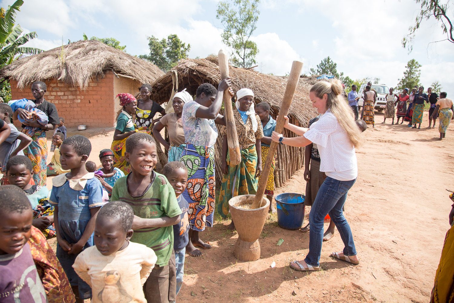  Kirsten helping make maize flour for the Nsima. 