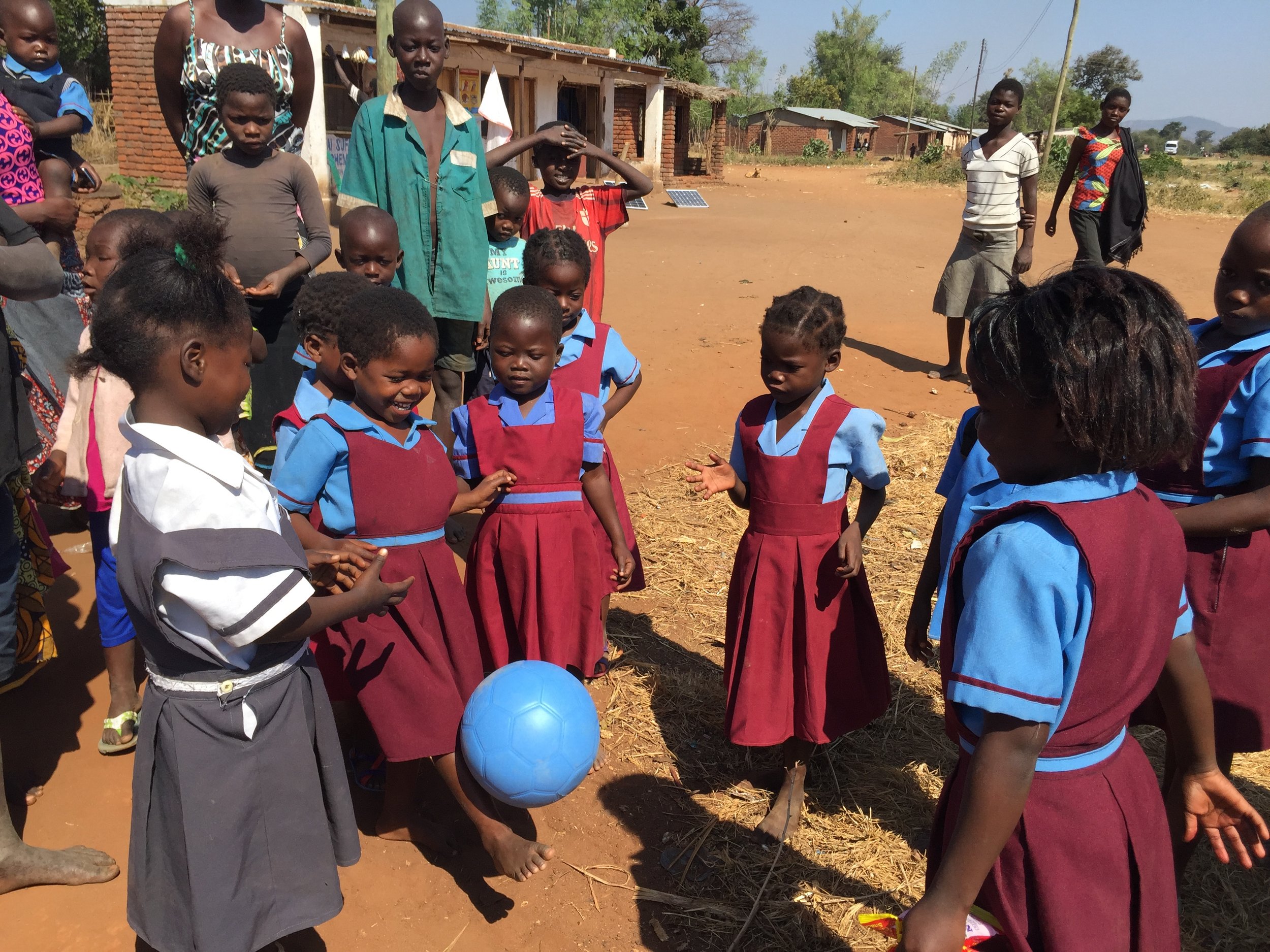  One of my favorite experiences was stopping at a village along the M5 coastal road, and giving children an  indestructible soccer ball  (one of 19 we brought to Malawi). Beforehand, they were playing with a ball of plastic bags wrapped in twine. Thi