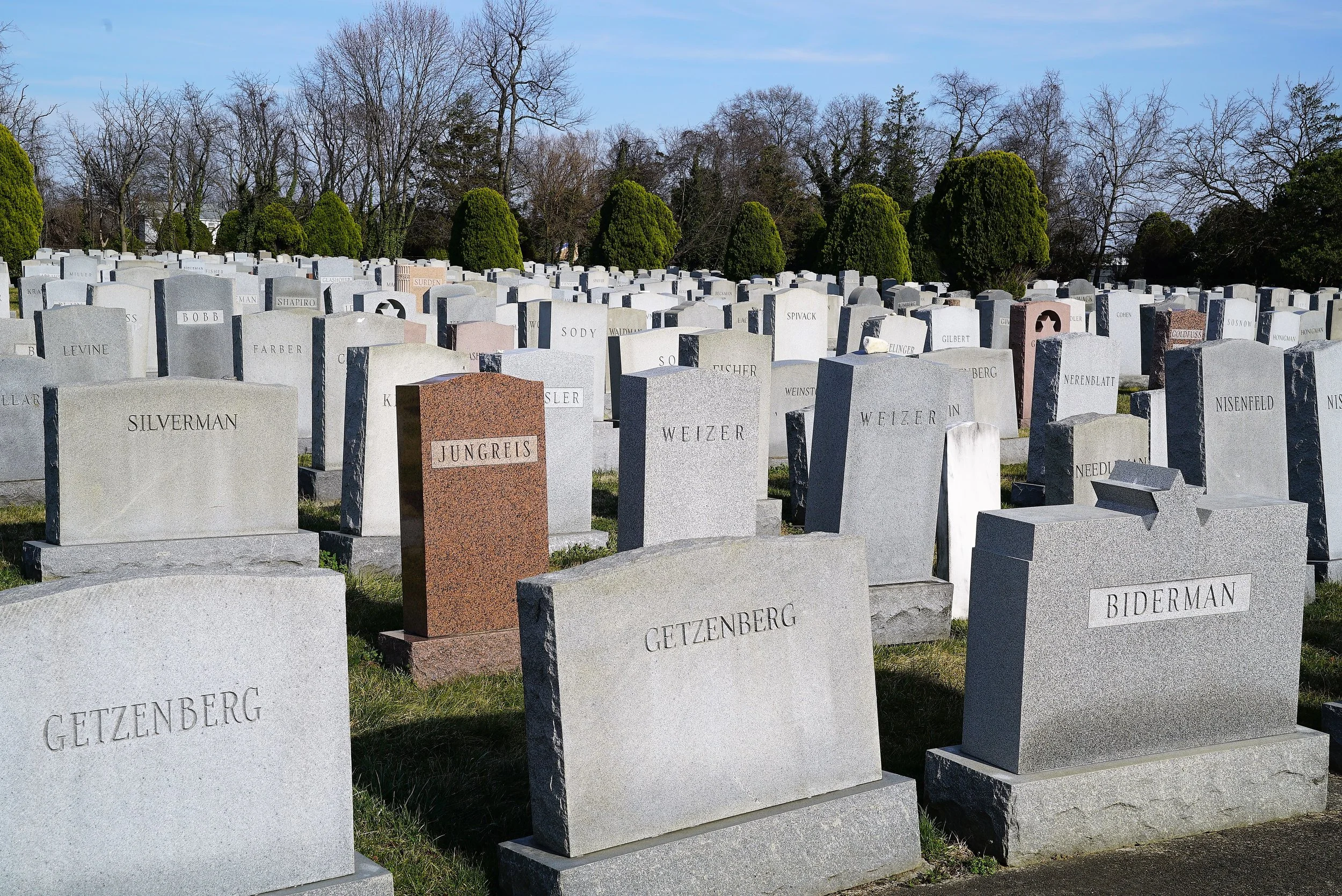 Photo: Many large headstones positioned tightly together at Mt. Lebanon Cemetery, Collingdale, Pennsylvania.