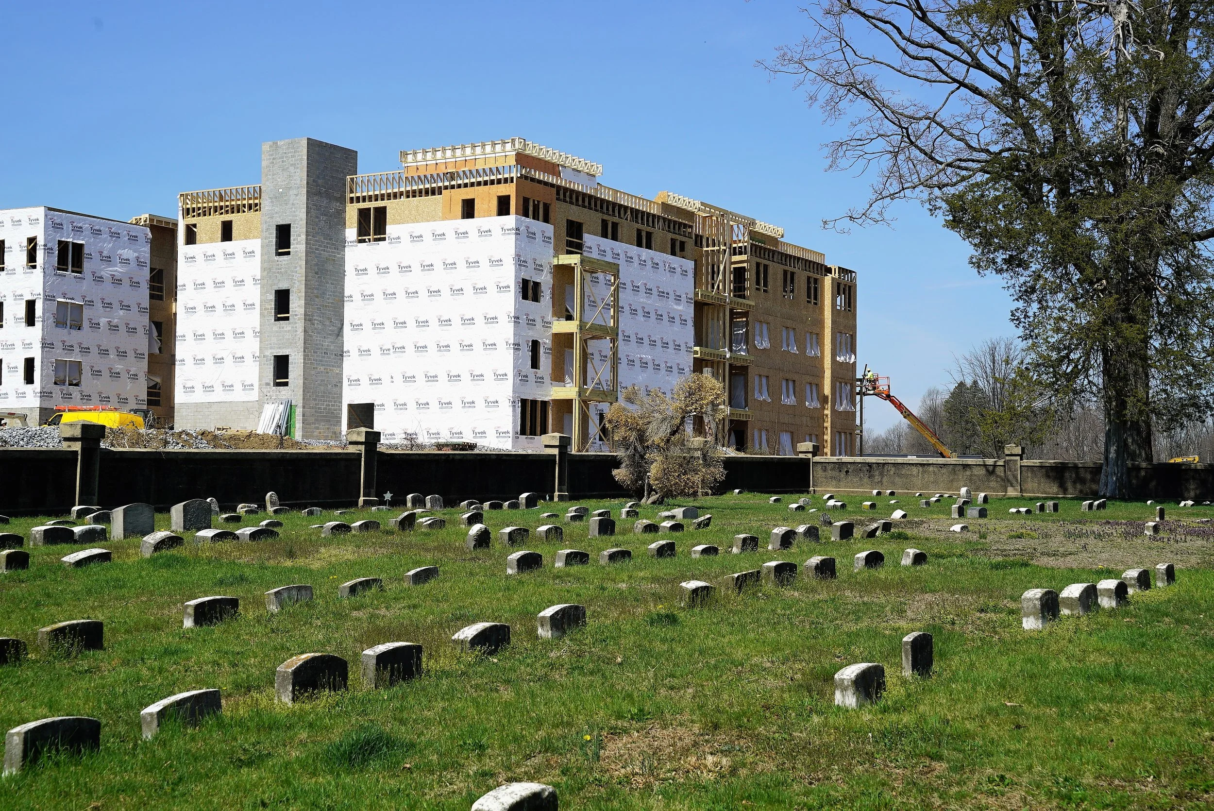 New apartment buildings going up behind the cemetery. Newtown Square Friends Meeting Burial Ground, in suburban Philadelphia.