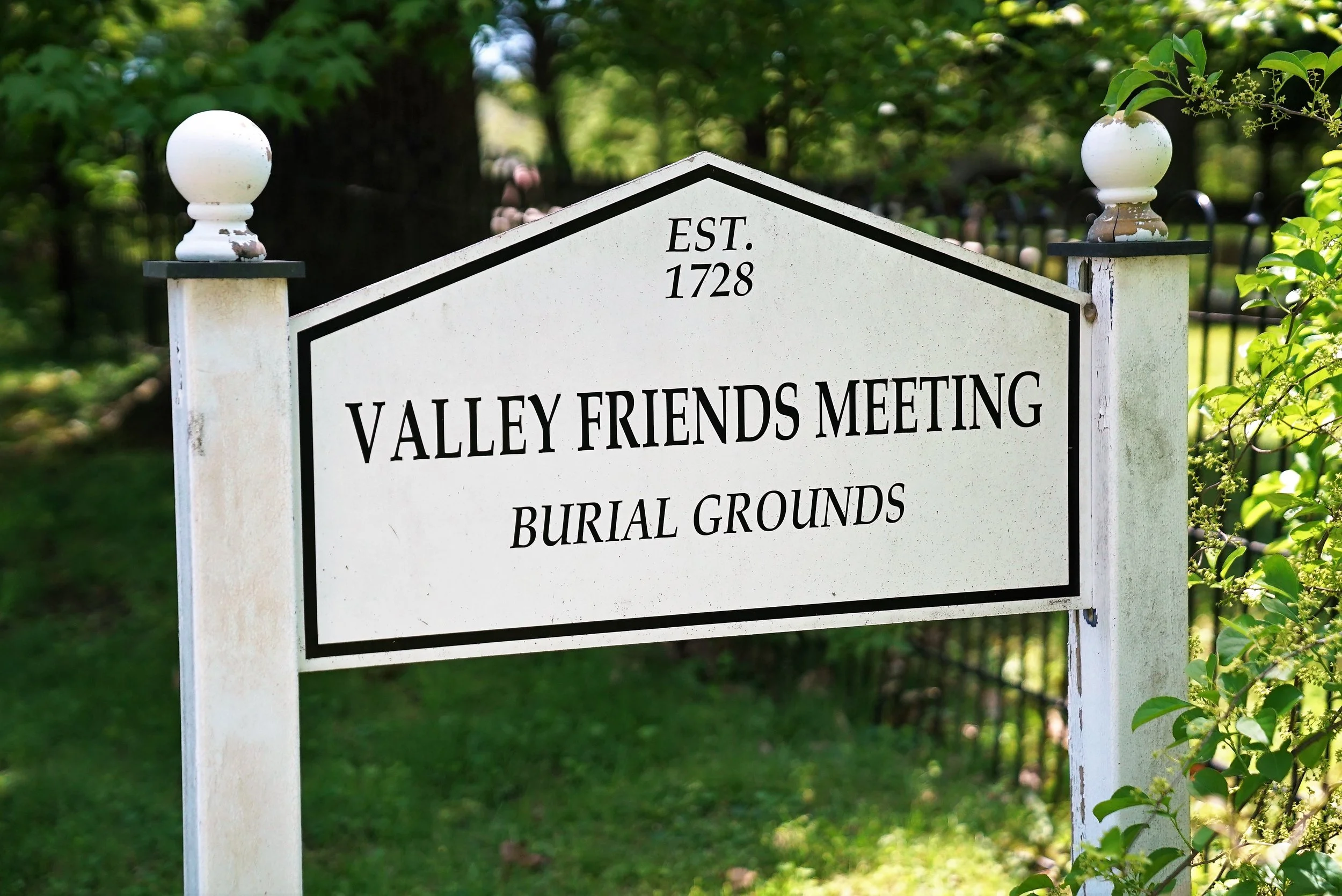 Roadside sign along side Valley Friends Meeting Burial Grounds. Wayne, Pennsylvania.