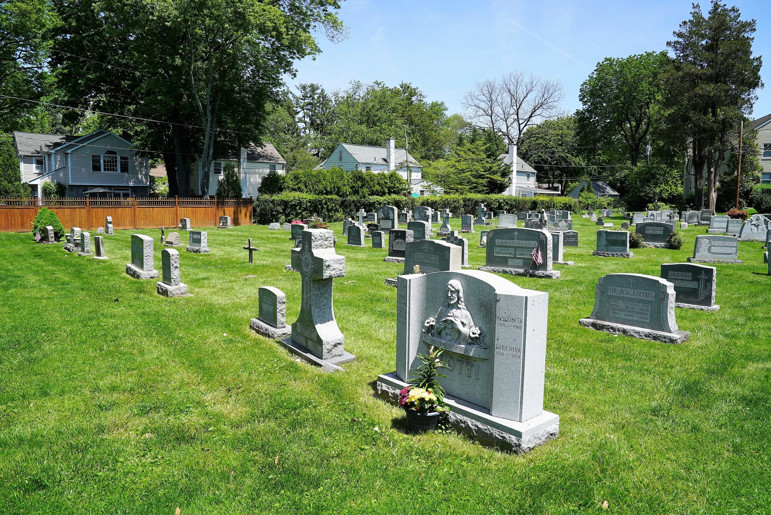 The backyard cemetery at Our Lady Of Assumption Church. Wayne, Pennsylvania.
