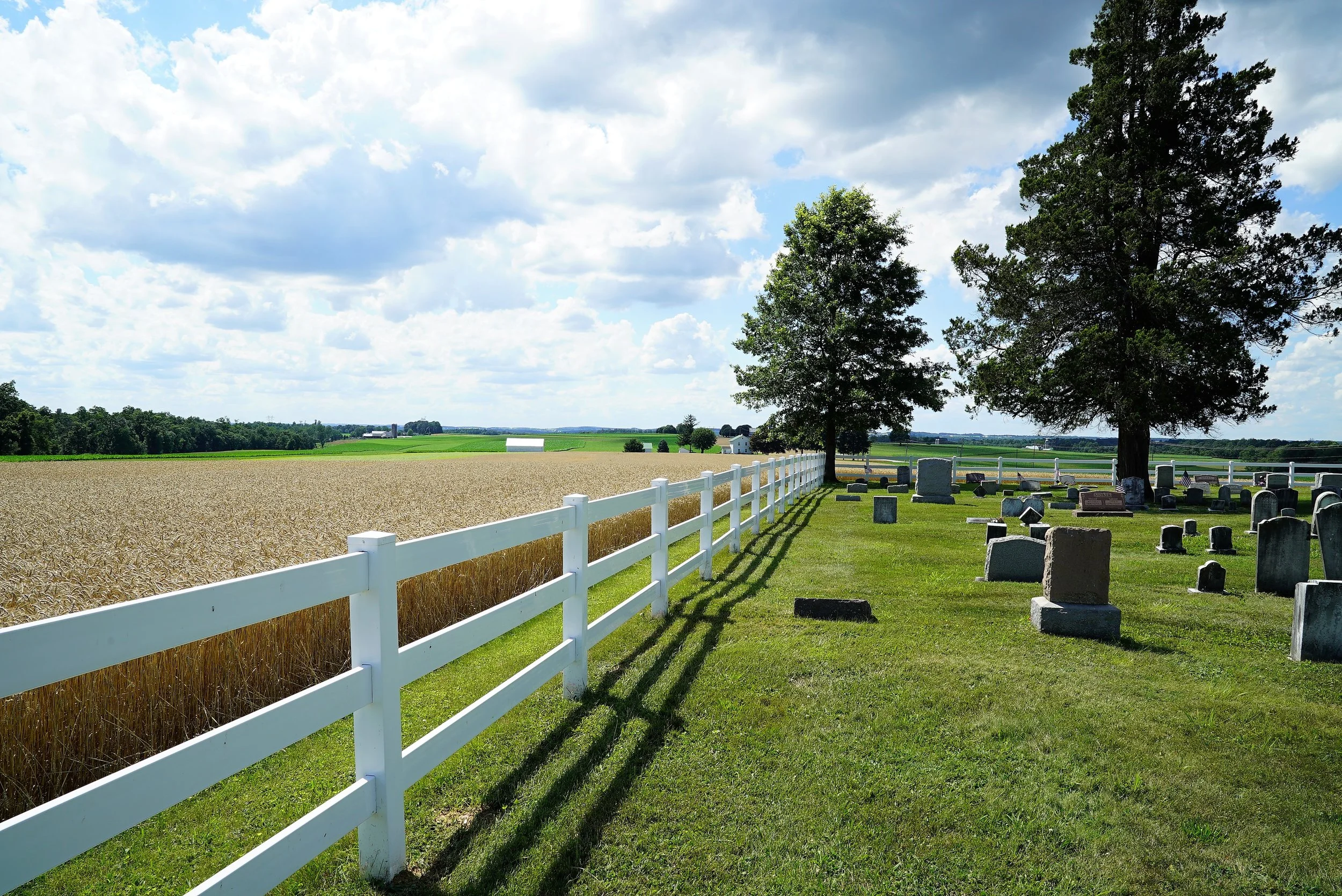 The cemetery at Beulah Baptist Church has vistas of lots of farm land. Oxford, Pennsylvania.