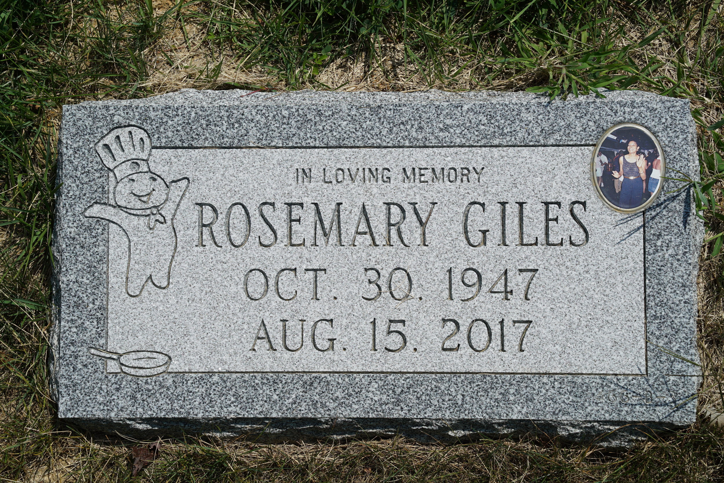  My favorite grave stone at White Chapel Memorial Park Cemetery. Hopefully the mowers will avoid running over and damaging that porcelain insert. 