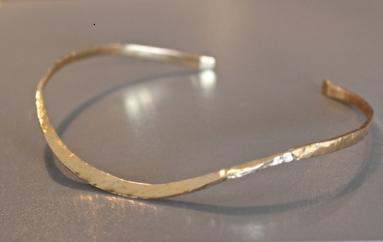   Hand-hammered neck collar  