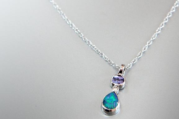   18k white gold necklace with opal, diamond and tanzanite  