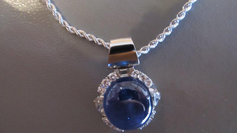   Platinum Gem Star Sapphire pendant with diamonds  