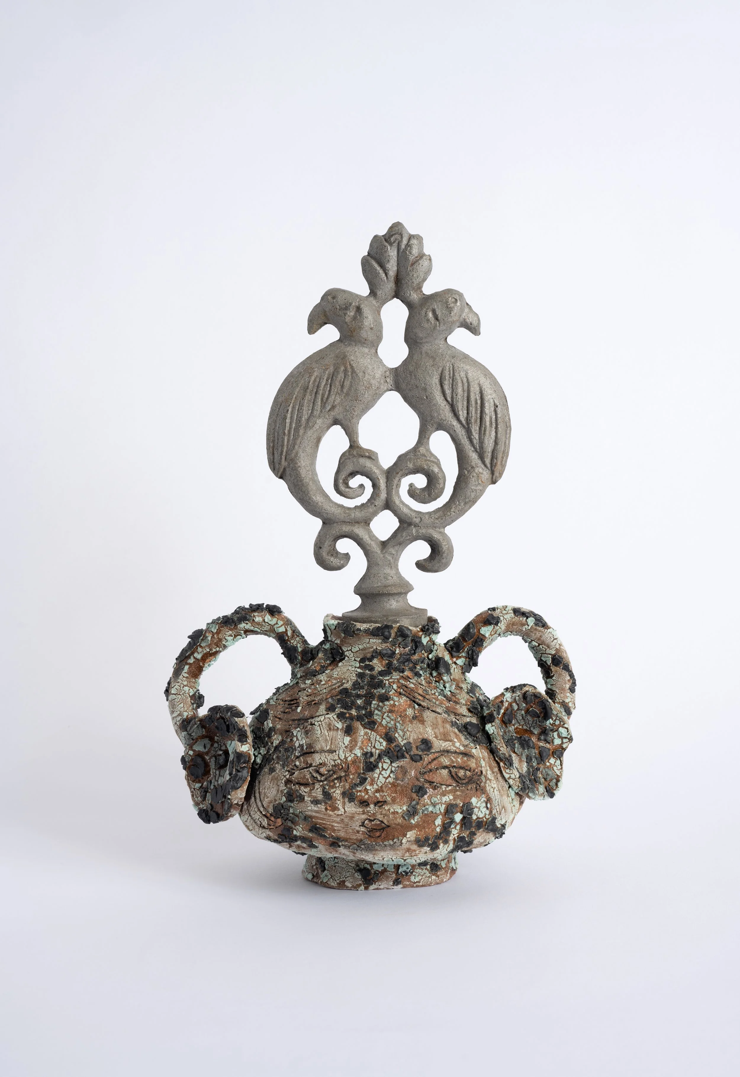  Whisper Woman  Custom glaze on stoneware, iron  20” x 10” x 5”   2023 