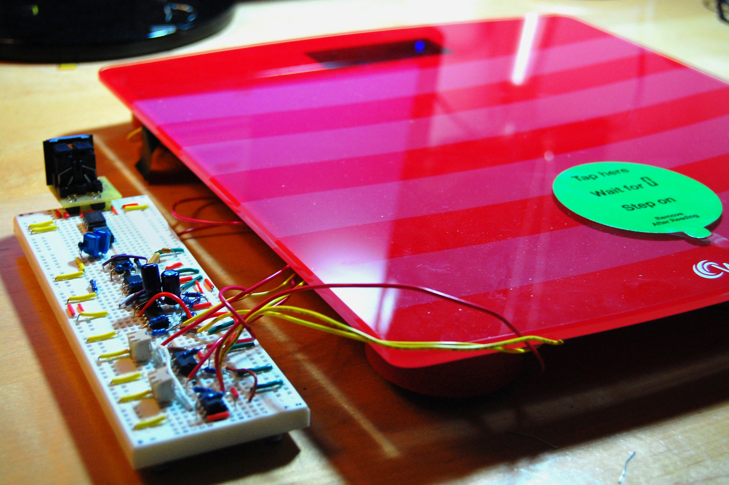 We modified a $40 bathroom scale - leveraging its sensors and swapping out its electronics for ours, to power the ballistocardiograph