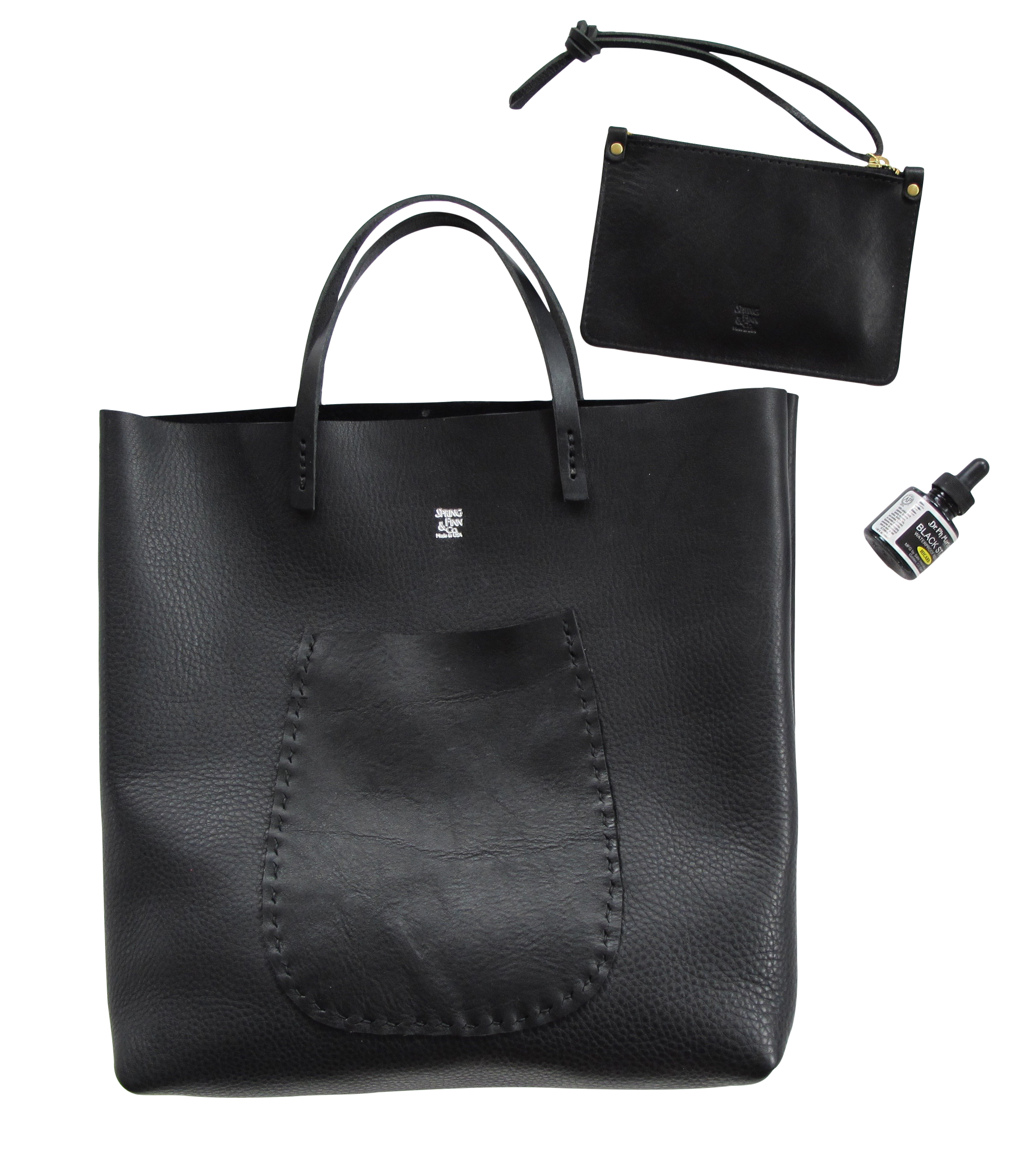 Large soft black leather tote with hand stitched front pocket and handles spring finn and co made in america