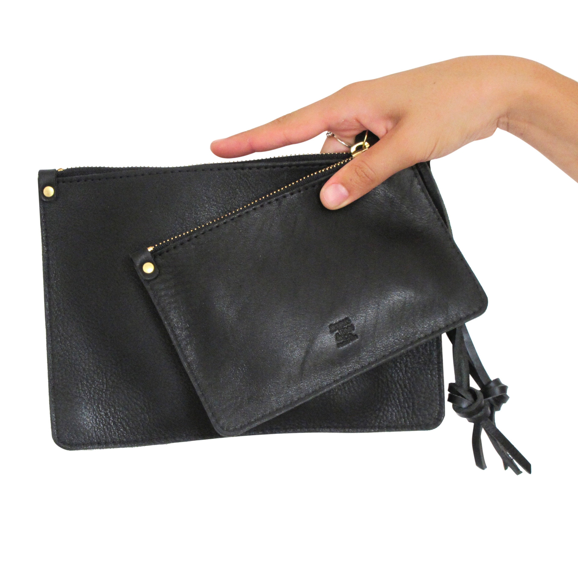 black leather zipped clutch with model